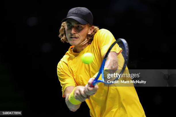 Max Purcell of Team Australia plays a backhand during the Davis Cup Finals Group Stage match between France and Australia at AO Arena on September...