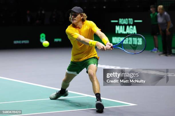 Max Purcell of Team Australia plays a backhand during the Davis Cup Finals Group Stage match between France and Australia at AO Arena on September...