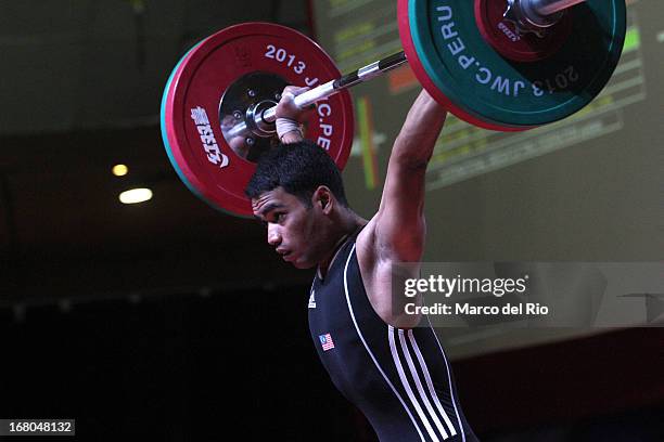 Aznil Bidin Mohd of Malaysia A competes in the Men's 56kg during day one of the 2013 Junior Weightlifting World Championship at Maria Angola...