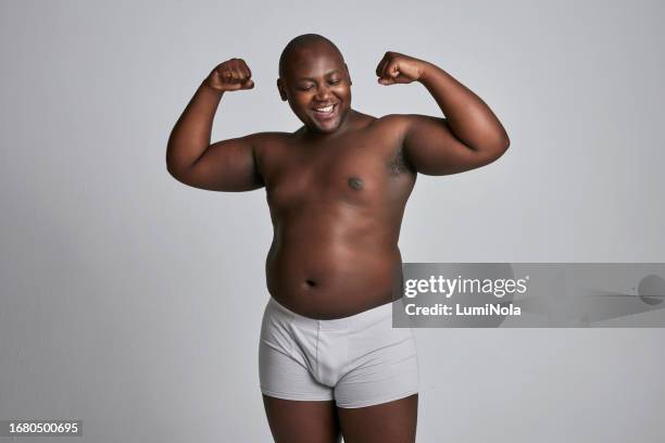 strong man in underwear, plus size and body positivity with health, fitness with inclusion on white background . shirtless, muscle and mockup space, confidence and african with wellness in studio - plus size model male stock pictures, royalty-free photos & images