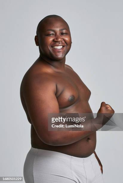 flex, plus size and a man in studio for strong muscle, underwear and lose weight for wellness. happy black person portrait on grey background for body positive, acceptance or inclusion and confidence - men underware model stock pictures, royalty-free photos & images