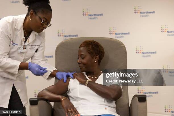 Sandra Lindsay, a registered nurse and vice president of public health advocacy at Northwell Health, is the first in the nation to receive the new...