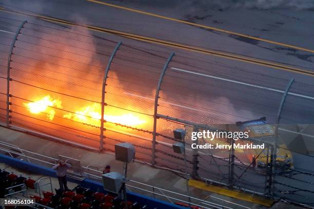 Alex Bowman, driver of the SchoolTipline.com Toyota, has fire come out of his car as he wrecked during the NASCAR Nationwide Series Aaron's 312 at...