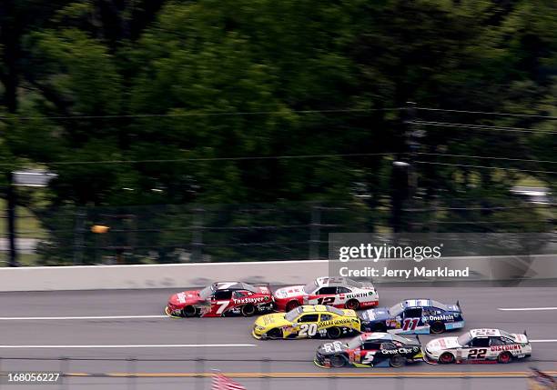 Regan Smith, driver of the TaxSlayer.com Chevrolet, Brian Vickers, driver of the Dollar General Toyota, Kasey Kahne, driver of the Great Clips...