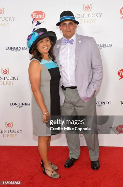 Coach Ron Rivera and Stephanie Rivera celebrate the 139th Kentucky Derby with Moet & Chandon at Churchill Downs on May 4, 2013 in Louisville,...