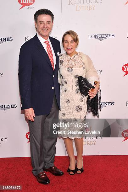 Coach Rick Pitino and Joanne Minardi attend the 139th Kentucky Derby at Churchill Downs on May 4, 2013 in Louisville, Kentucky.