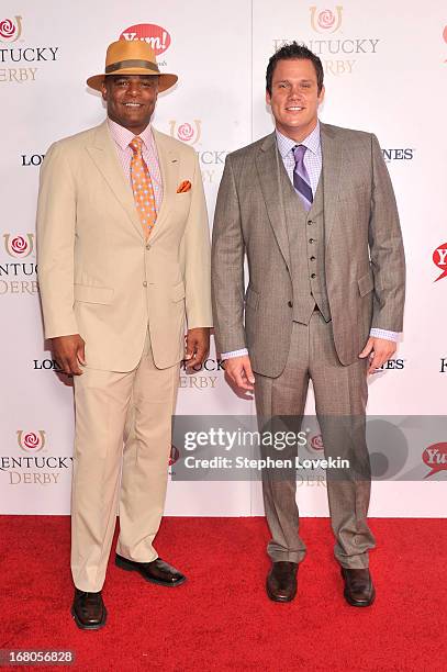 Warren Moon and Bob Guiney attend the 139th Kentucky Derby at Churchill Downs on May 4, 2013 in Louisville, Kentucky.