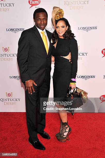 Avery Johnson and Cassandra Johnson attend the 139th Kentucky Derby at Churchill Downs on May 4, 2013 in Louisville, Kentucky.