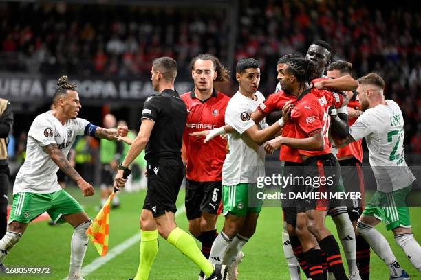 Players argue during the Europa League Group F football match between Stades Rennais FC and Maccabi Haifa FC at The Roazhon Park Stadium in Rennes,...