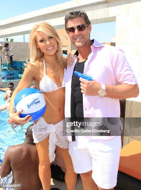 Television personalities Gretchen Rossi and Slade Smiley pose at Sapphire Pool & Day Club grand opening party on May 4, 2013 in Las Vegas, Nevada.