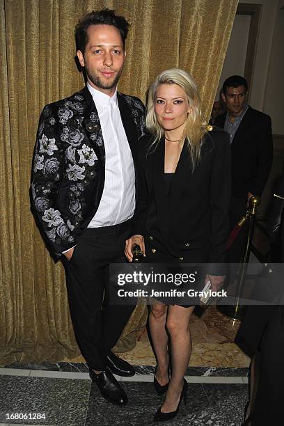 Writer Derek Blasberg and designer Kate Young attend Moda Operandi and St. Regis Hotels & Resorts event "A Midnight Supper" to celebrate the launch...