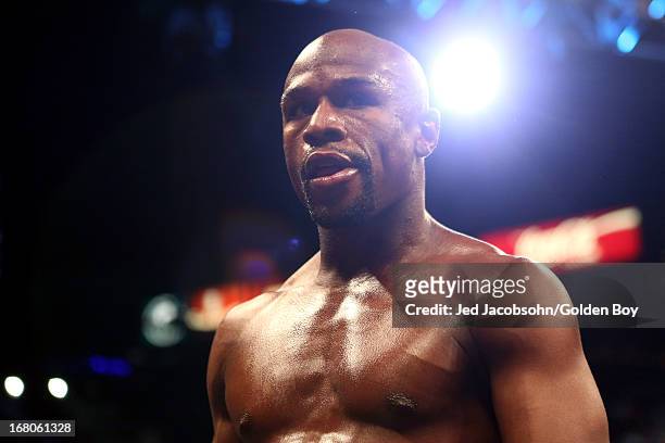 Floyd Mayweather Jr. Looks on from in the ring while taking on Robert Guerrero in their WBC welterweight title bout at the MGM Grand Garden Arena on...