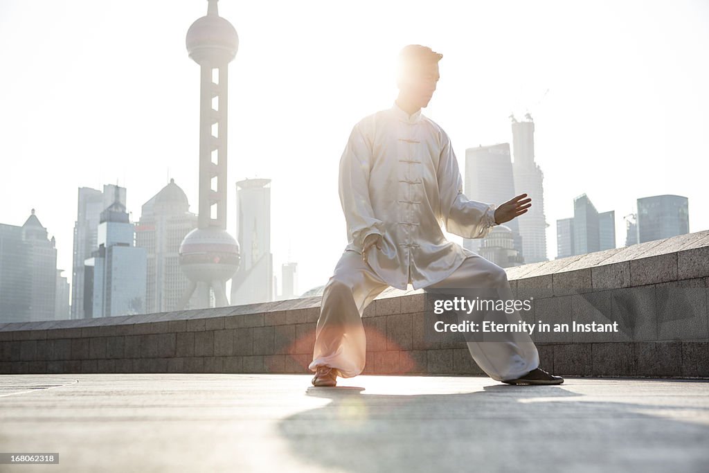 Chinese Tai Chi Master with Shanghai cityscape