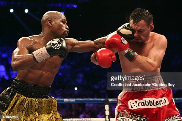 Floyd Mayweather Jr. Connects with a left to the face of Robert Guerrero in their WBC welterweight title bout at the MGM Grand Garden Arena on May 4,...