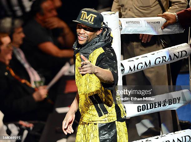 Floyd Mayweather Jr. Celebrates his unanimous-decision victory against Robert Guerrero in their WBC welterweight title bout at the MGM Grand Garden...