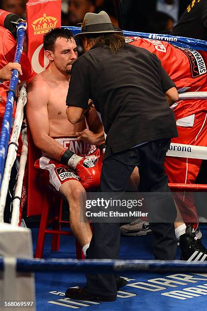 Trainer Ruben Guerrero talks with boxer/son Robert Guerrero as he takes on Floyd Mayweather Jr. In their WBC welterweight title bout at the MGM Grand...