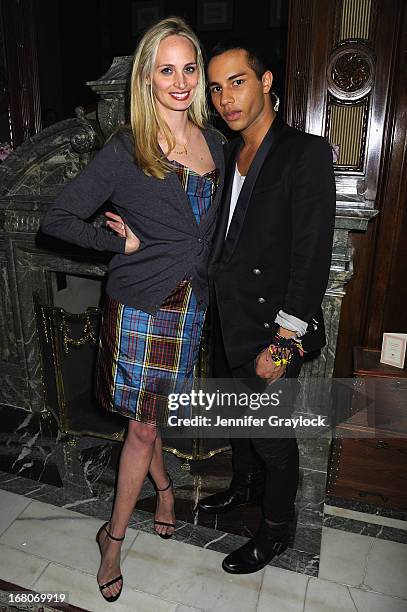 Designer Olivier Rousteing and Lauren Santo Domingo attend Moda Operandi and St. Regis Hotels & Resorts event "A Midnight Supper" to celebrate the...