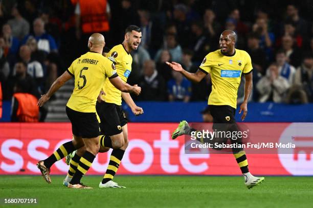 Djibril Sidibe of AEK Athens celebrate with Ehsan Hajsafi and Nordin Amrabat after scoring goal during the UEFA Europa League match between Brighton...