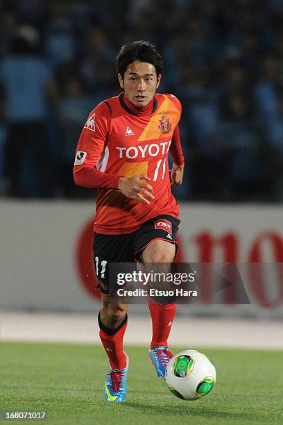 Keiji Tamada of Nagoya Grampus in action during the J.League match between Kawasaki Frontale and Nagoya Grampus at Todoroki Stadium on May 3, 2013 in...