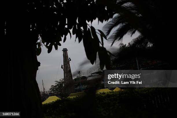 Competitors Take Part In the selection contest for the finalists of the Cheung Chau Bun Scrambling Competition in Cheung Chau, on May 5, 2013 in Hong...