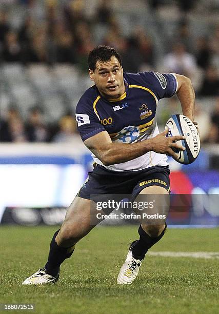 George Smith of the Brumbies runs the ball during the round 12 Super Rugby match between the Brumbies and the Crusaders at Canberra Stadium on May 5,...