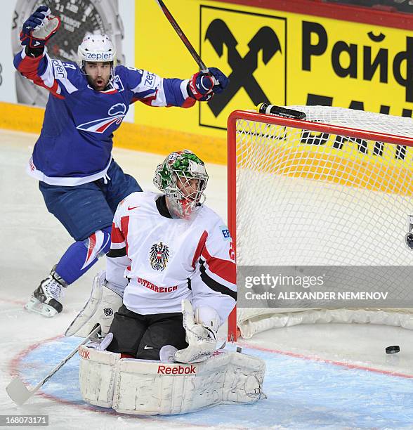 French forward Damien Fleury celebrates scoring past Austria's goalkeeper Bernhard Starkbaum during the preliminary round match France vs Austria at...