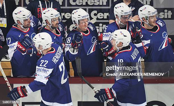 French players celebrate scoring during the preliminary round match France vs Austria at the IIHF International Ice Hockey World Championship in...