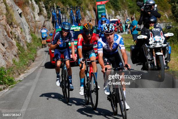 Max Poole of The United Kingdom and Team DSM - firmenich, Damiano Caruso of Italy and and Team Bahrain - Victorious and Remco Evenepoel of Belgium...