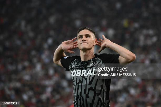 Freiburg's Hungarian midfielder Roland Sallai celebrates after scoring his team's first goal during the UEFA Europa League group A football match...