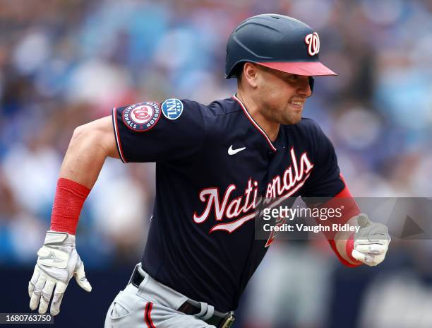 Lane Thomas of the Washington Nationals runs to first base against the Toronto Blue Jays at Rogers Centre on August 30, 2023 in Toronto, Ontario,...