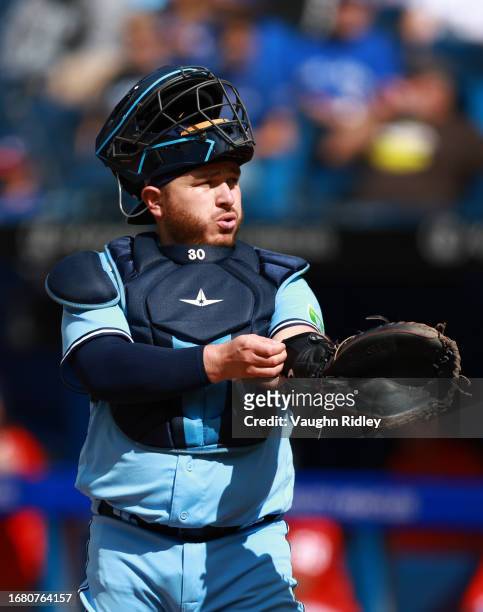 Alejandro Kirk of the Toronto Blue Jays reacts against the Washington Nationals at Rogers Centre on August 30, 2023 in Toronto, Ontario, Canada.