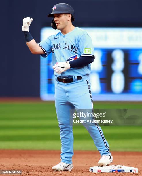 Daulton Varsho of the Toronto Blue Jays celebrates after hitting a double against the Washington Nationals at Rogers Centre on August 30, 2023 in...