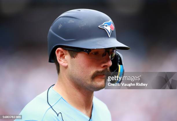 Davis Schneider of the Toronto Blue Jays runs to the dugout against the Washington Nationals at Rogers Centre on August 30, 2023 in Toronto, Ontario,...