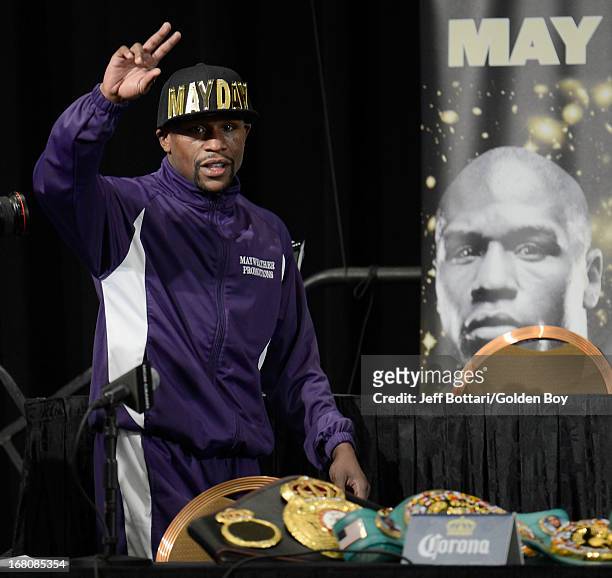 Floyd Mayweather Jr. Waves to the crowd during the news conference after the Floyd Mayweather Jr. And Robert Guerrero fight at the MGM Grand Garden...