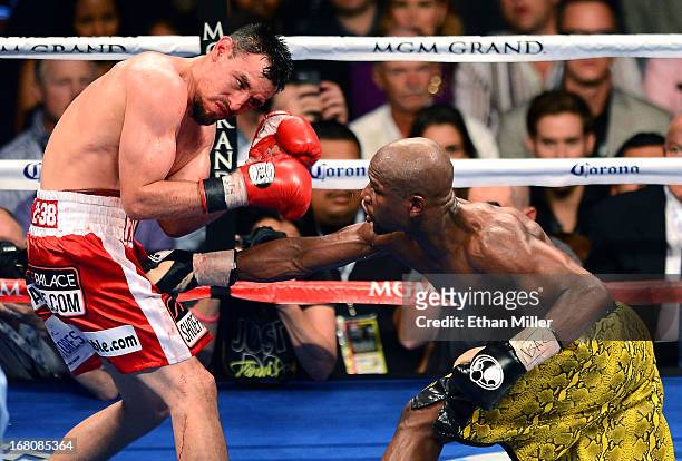 Floyd Mayweather Jr. Hits Robert Guerrero during the eighth round of their WBC welterweight title bout at the MGM Grand Garden Arena on May 4, 2013...