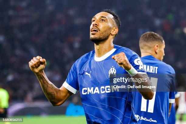 IAMSTERDAM, NETHERLANDS Pierre Emerick Aubameyang of Olympique Marseille scores the 3-3 celebrating his goal during the UEFA Europa League Group B...