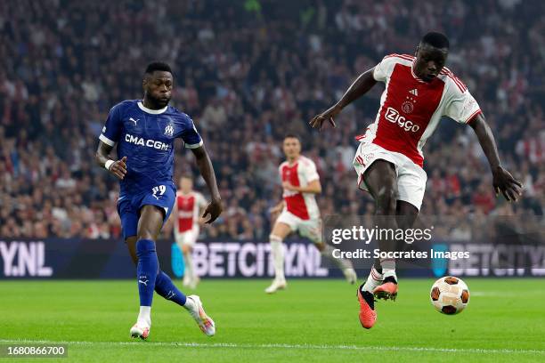 Chancel Mbemba of Olympique Marseille, Brian Brobbey of Ajax during the UEFA Europa League match between Ajax v Olympique Marseille at the Johan...