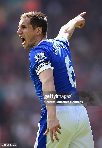Phil Jagielka of Everton gestures during the Barclays Premier League match between Liverpool and Everton at Anfield on May 5, 2013 in Liverpool,...