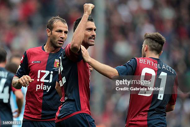 Marco Borriello of Genoa CFC celebrates with team-mates after scoring a goal during the Serie A match between Genoa CFC and Pescara at Stadio Luigi...