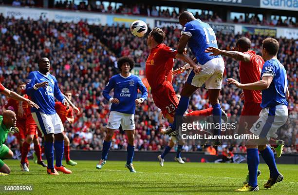 Sylvain Distin of Everton scores a disallowed goal during the Barclays Premier League match between Liverpool and Everton at Anfield on May 5, 2013...