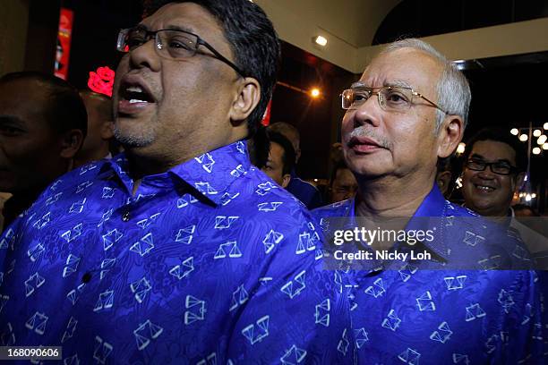 Malaysia's Prime Minister and Barisan Nasional chairman Najib Razak arrives at UMNO headquarters during election day on May 5, 2013 in Kuala Lumpur,...