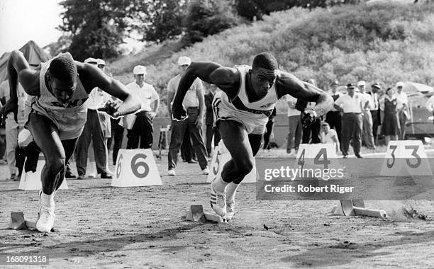 American athlete Bob Hayes takes off from the starting blocks as he sprints for Florida A&M University , early 1960's.