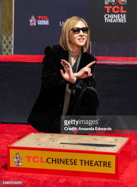 Musician Yoshiki attends his hand and footprint in cement ceremony at the TCL Chinese Theatre on September 14, 2023 in Hollywood, California.