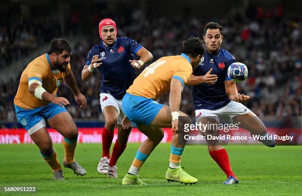 Arthur Vincent of France plays a pass ahead of Bautista Basso of Uruguay during the Rugby World Cup France 2023 match between France and Uruguay at...
