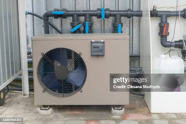 heat pump outdoor - heat pump fotografías e imágenes de stock