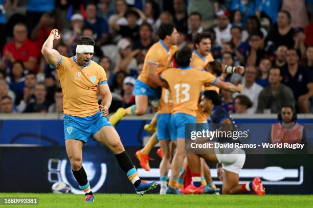 Andres Vilaseca of Uruguay celebrates as Felipe Etcheverry of Uruguay scores his team's second try of which was later disallowed by the TMO Official...