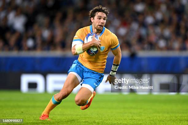 Felipe Etcheverry of Uruguay breaks forward to scores his team's second try of which was later disallowed by the TMO Official for obstruction during...