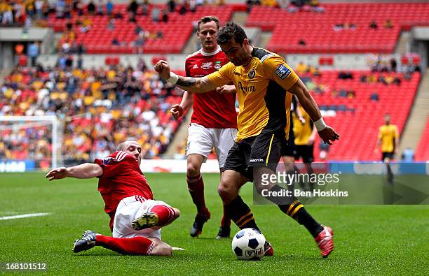 Andy Sandell of Newport crosses the ball ahead of Stephen Wright of Newport during the Blue Square Bet Premier Conference Play-off Final match...