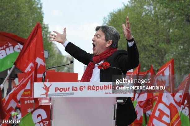 Jean-Luc Melenchon, leader of Front de Gauche left wing party, gestures as he gives a speech on May 5, 2013 in Paris, during a demonstration called...