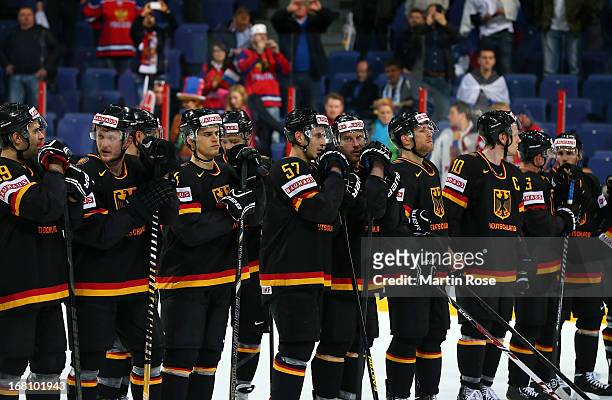 The team of Germany looks dejetced after the IIHF World Championship group H match between Germany and Russia at Hartwall Areena on May 5, 2013 in...